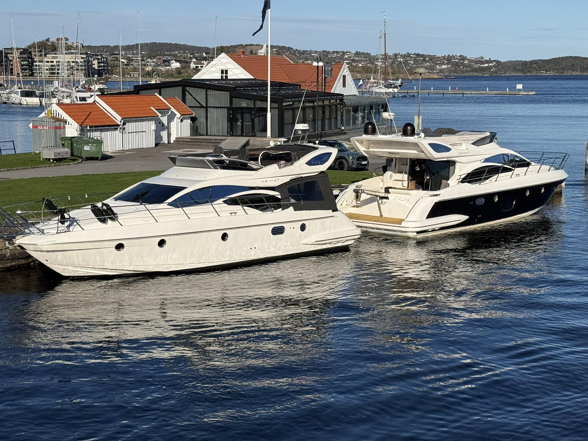 The fleet: the second white-hulled Azimut on the left, Frøya on the right — original photograph