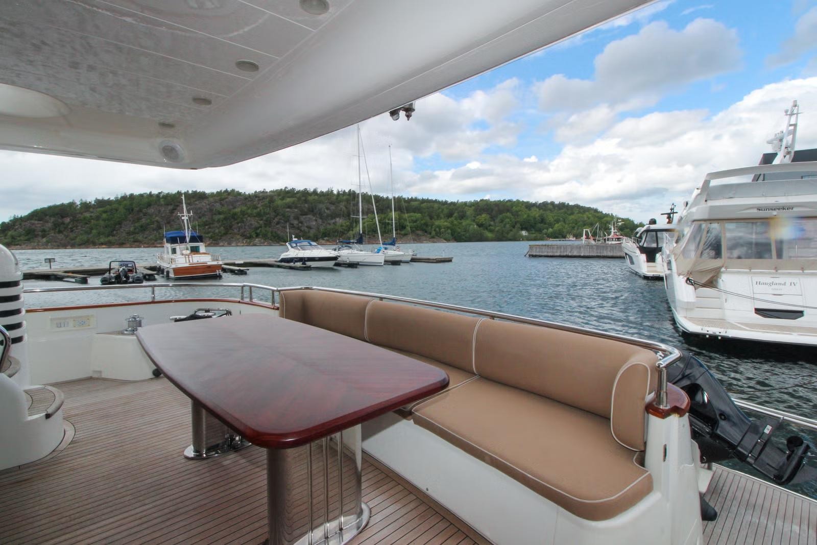 Marit — covered aft-deck dining