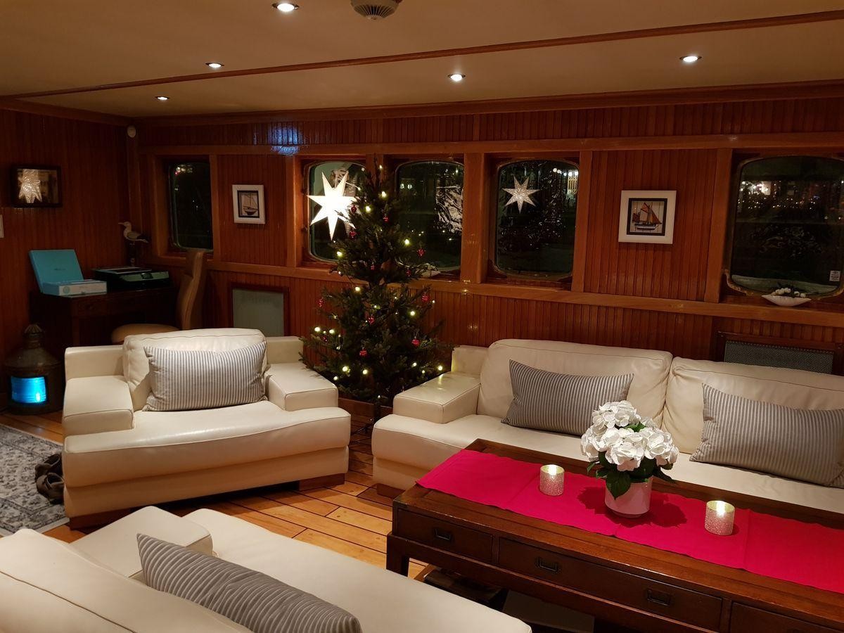 Ragnhild — classic wood-panelled salon
