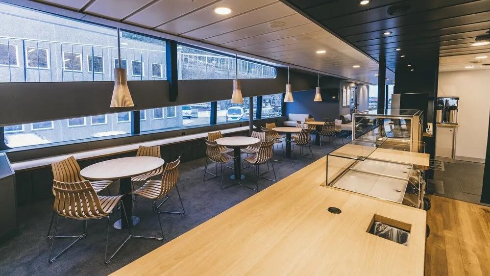 Solveig — modern lounge with full-height windows