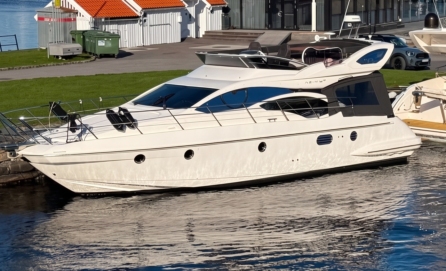 Second Azimut yacht, with white hull, moored in Kristiansand — cropped and enhanced original photograph